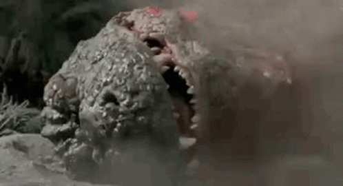 Close Up Monster Head With Open Mouth and Teeth
