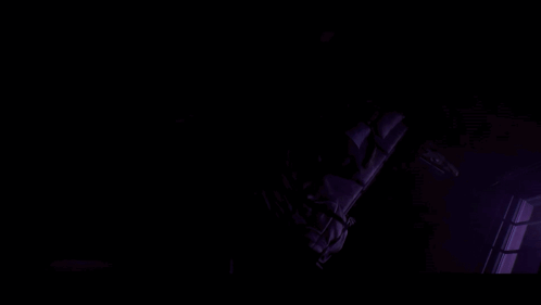 Close-Up Of A Woman's Eyes With Dark Background GIF