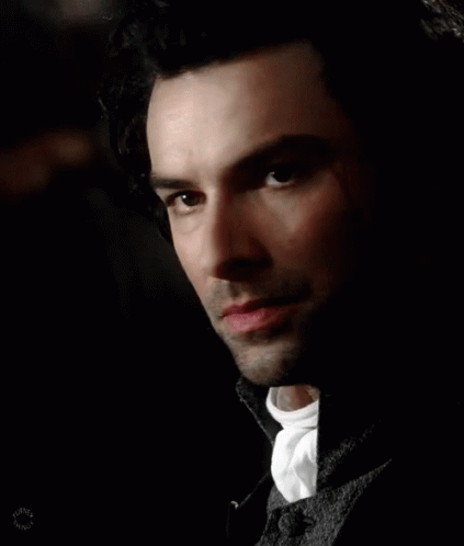 Close Up Of Bearded Man's Face In Darkness GIF