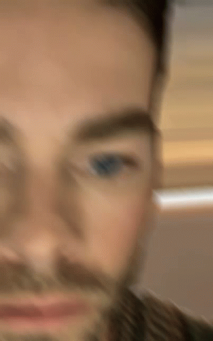 Close Up of Bearded Man with Blue Eyes