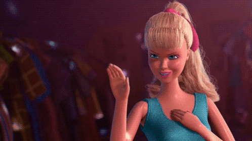 Close Up Of Blonde Barbie Doll GIF