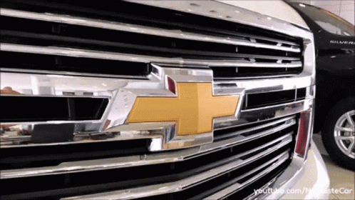 Close Up of Chevrolet Grill With Yellow Cross