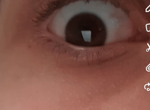 Close Up of Eye With Icons
