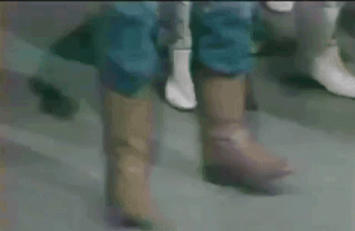 Close Up of Feet in Brown Boots