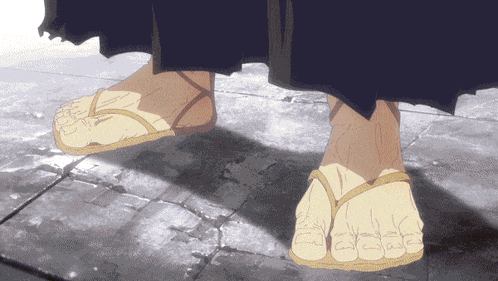 Close Up of Feet in Flip Flops
