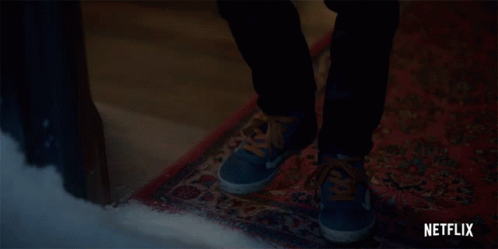 Close Up Of Feet With Netflix Logo GIF