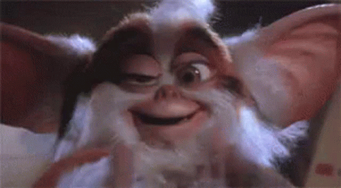 Close Up of Gremlin Smiling With Eyes Closed