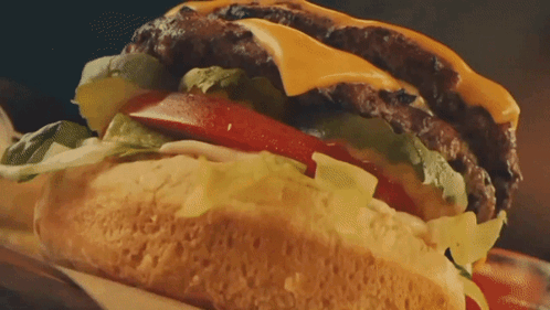 Close Up Of Hamburger With Lettuce And Tomatoes GIF
