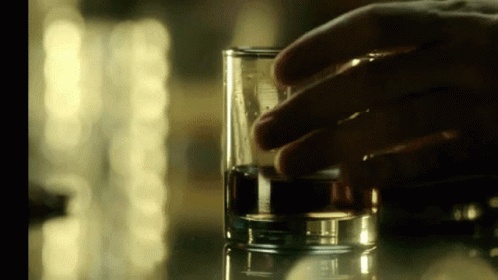 Close Up Of Hand Holding Glass GIF