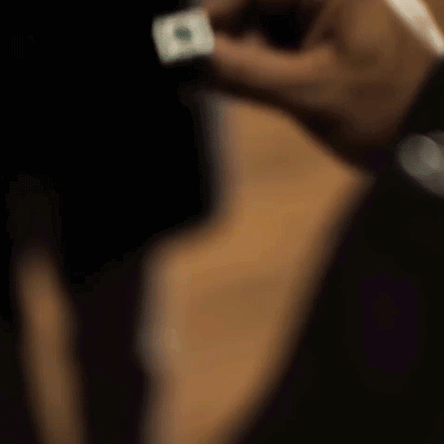 Close Up Of Hand Holding Green Lantern Ring GIF