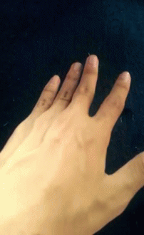 Close Up of Hand on Black Background