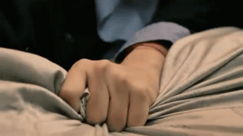 Close Up of Hand on Fabric