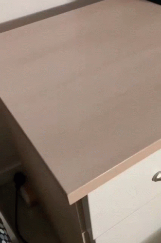 Close Up of Hand Opening a Drawer