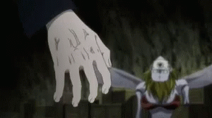 Close Up of Hand With Tattoo and Monster in Background