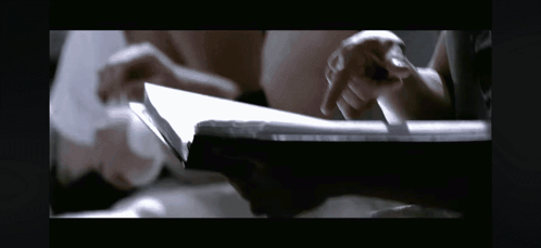 Close Up of Hands Holding Paper
