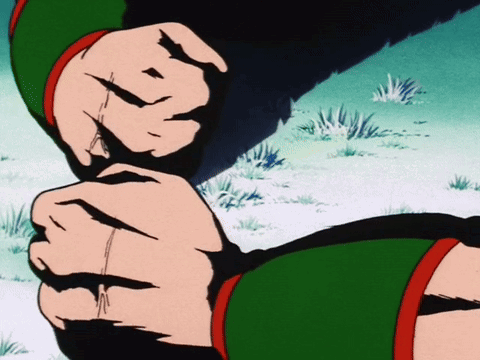 Close Up of Hands in Green Shirt