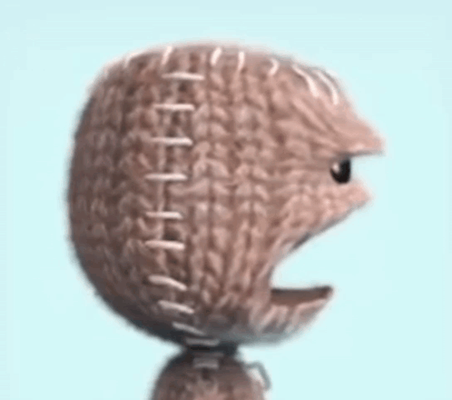 Close Up of Knitted Ball with Stitching