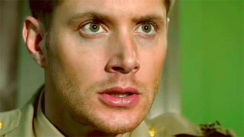 Close Up Of Man Face With Green Background GIF