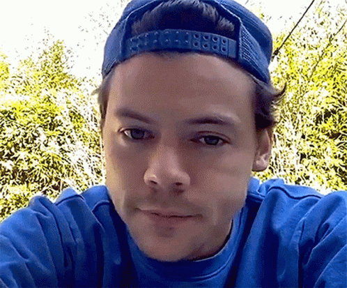 Close Up of Man in Blue Hat and Blue Sweatshirt