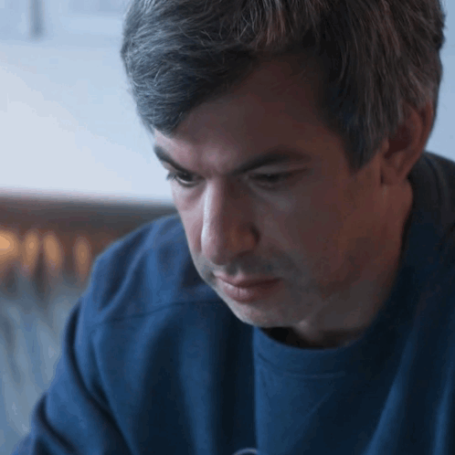 Close Up of Man in Blue Shirt