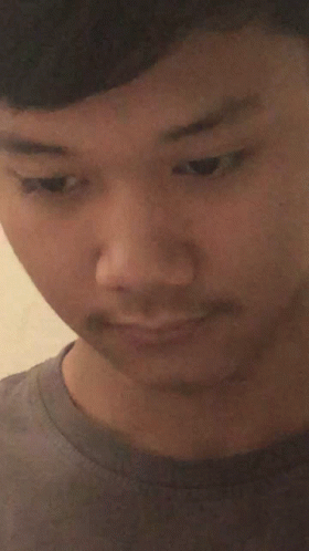 Close Up of Man in Gray Shirt