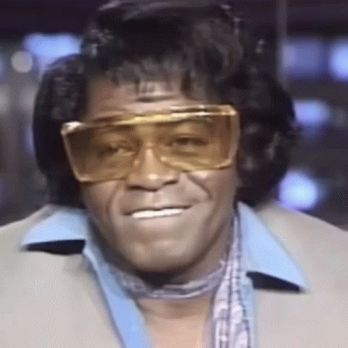 Close-up of Man in Suit and Sunglasses Smiling