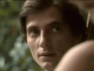 Close Up of Man Looking at Another Man