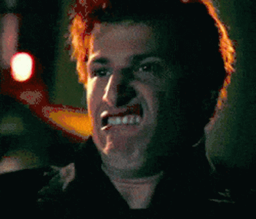 Close Up of Man Making Face With Mouth Open