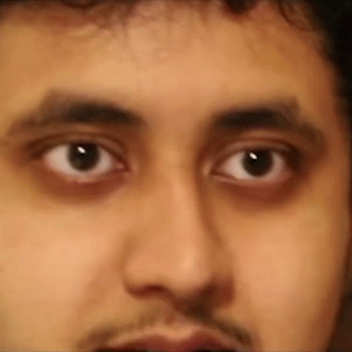 Close Up of Man's Eyes With Beard and Mustache