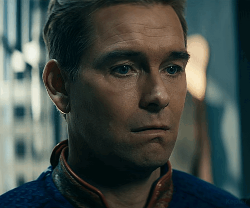 Close Up of Man's Face in Blue Jacket