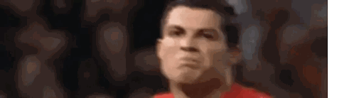 Close Up of Man's Face in Red Shirt