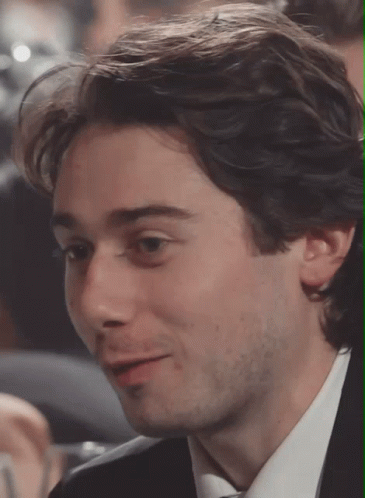 Close Up of Man's Face in Suit and Tie