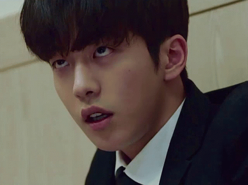 Close Up of Man's Face in Suit and Tie