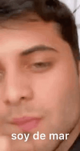 Close Up of Man's Face Soy de Mar