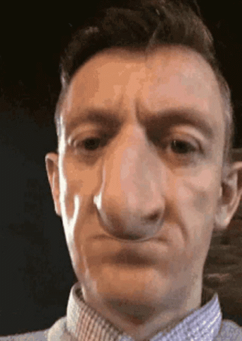 Close Up of Man's Face with Big Nose