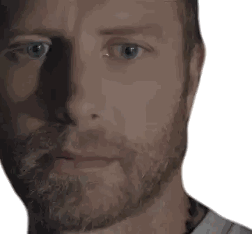 Close Up of Man's Face with Blue Eyes and Beard