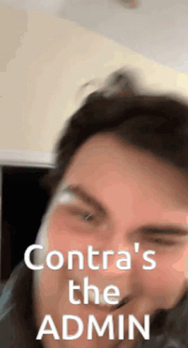 Close Up Of Man's Face With Contra Text GIF