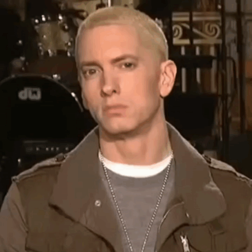 Close Up Of Man's Face With Drum GIF
