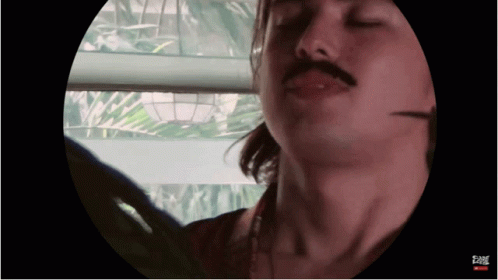 Close Up Of Man's Face With Fame Text GIF