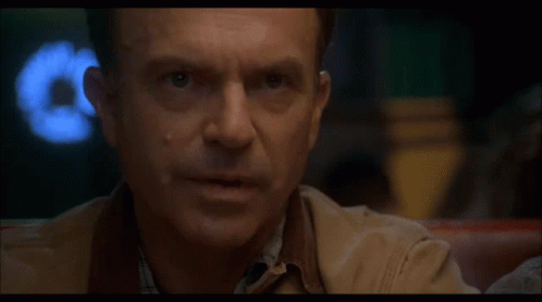 Close-Up Of Man's Face With Letter E GIF