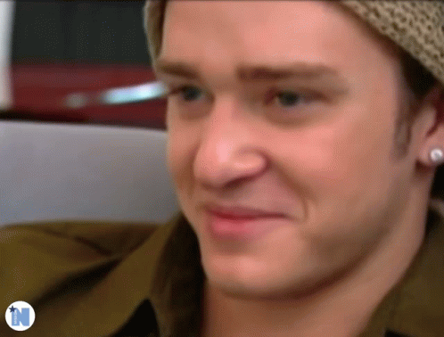 Close Up of Man's Face with Letter N