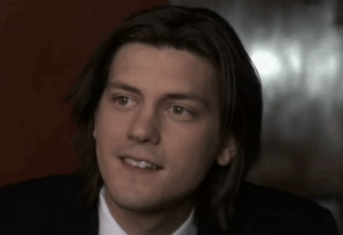 Close Up of Man's Face with Long Hair