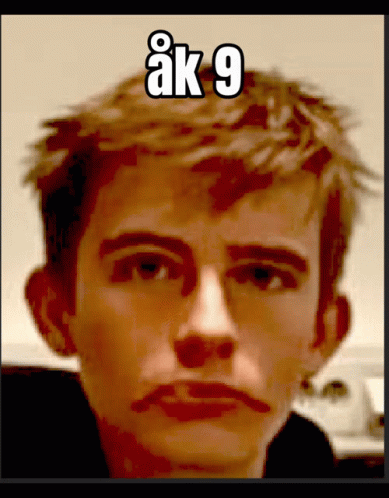 Close Up of Man's Face With Number 9