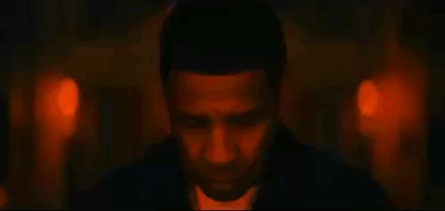 Close Up of Man's Face With Red and Blue Lights