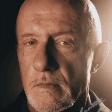Close Up Of Man's Face With Signature GIF