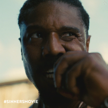 Close Up of Man's Face with Sinners Movie Hashtag