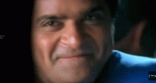 Close Up Of Man's Face With Telugu Logo GIF