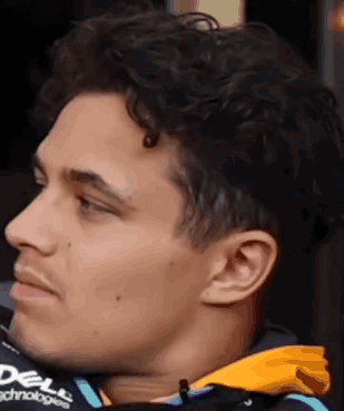Close Up Of Man With Curly Hair In Jacket GIF