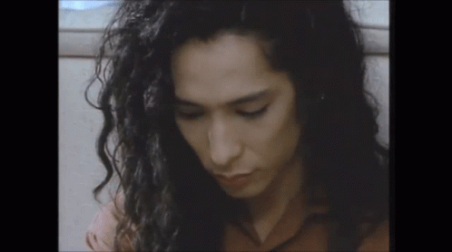 Close Up of Man with Long Curly Hair