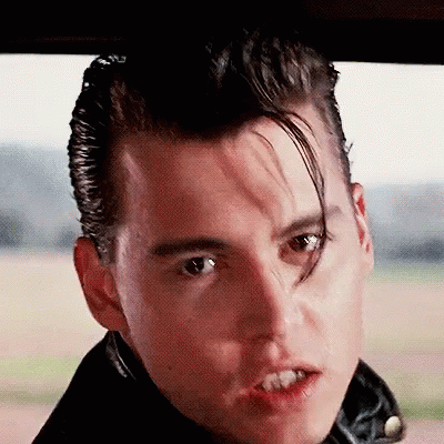 Close Up Of Man With Mohawk And Black Jacket GIF